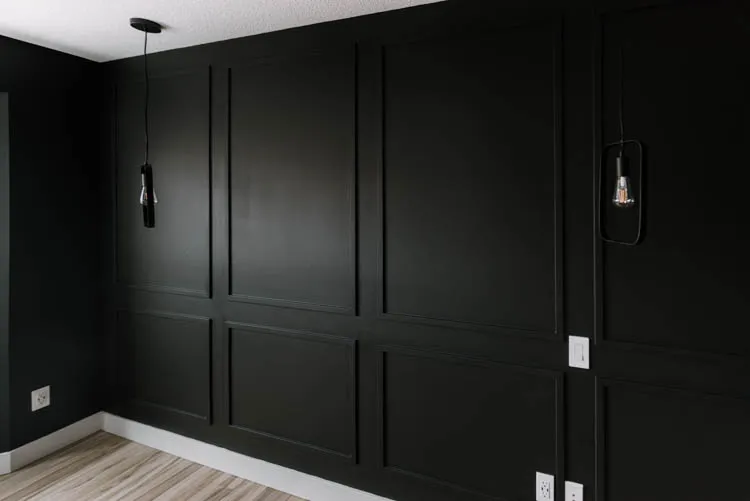 Vertical Wood Trim on a Black Wall